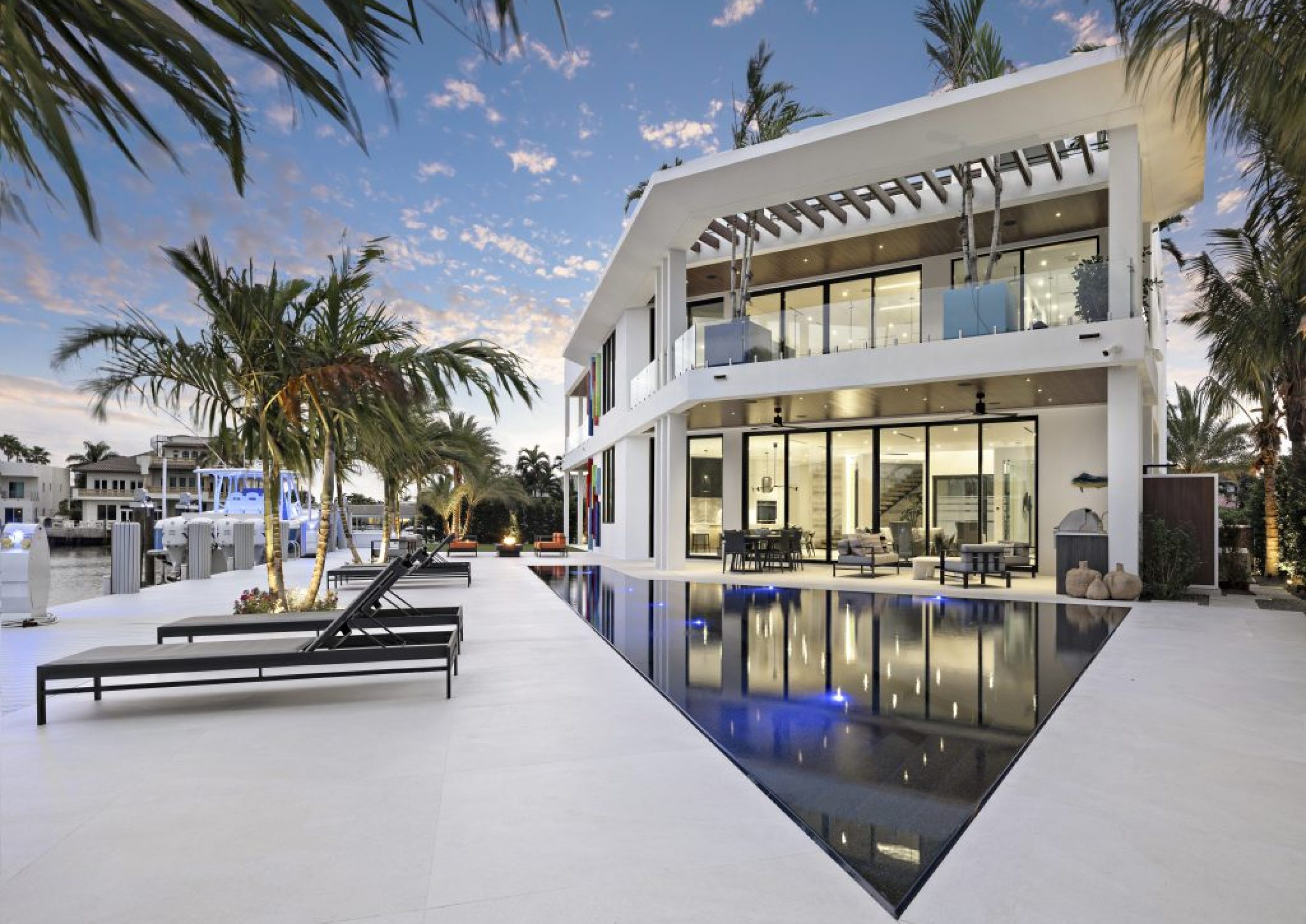 Modern waterfront residence designed to maximize elevation, views, and seamless indoor-outdoor living across multiple levels. Defined by clean geometry and expansive terraces, the home is executed with precision to create a balanced, highly functional coastal environment.